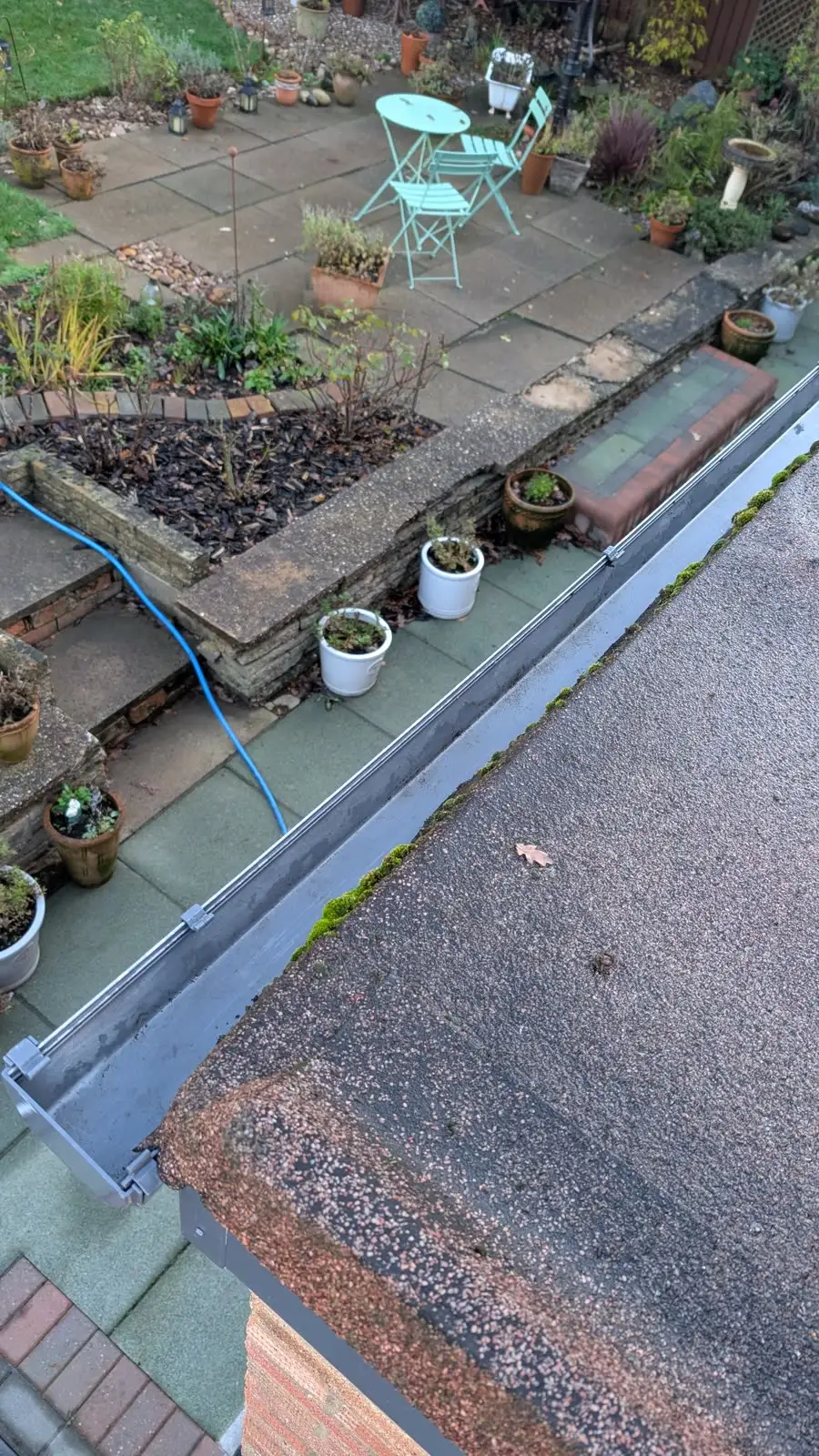 Flat-roof gutter, Islington — after cleaning