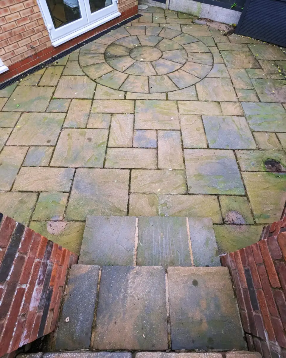 Patio with feature circle, Hillingdon — before cleaning