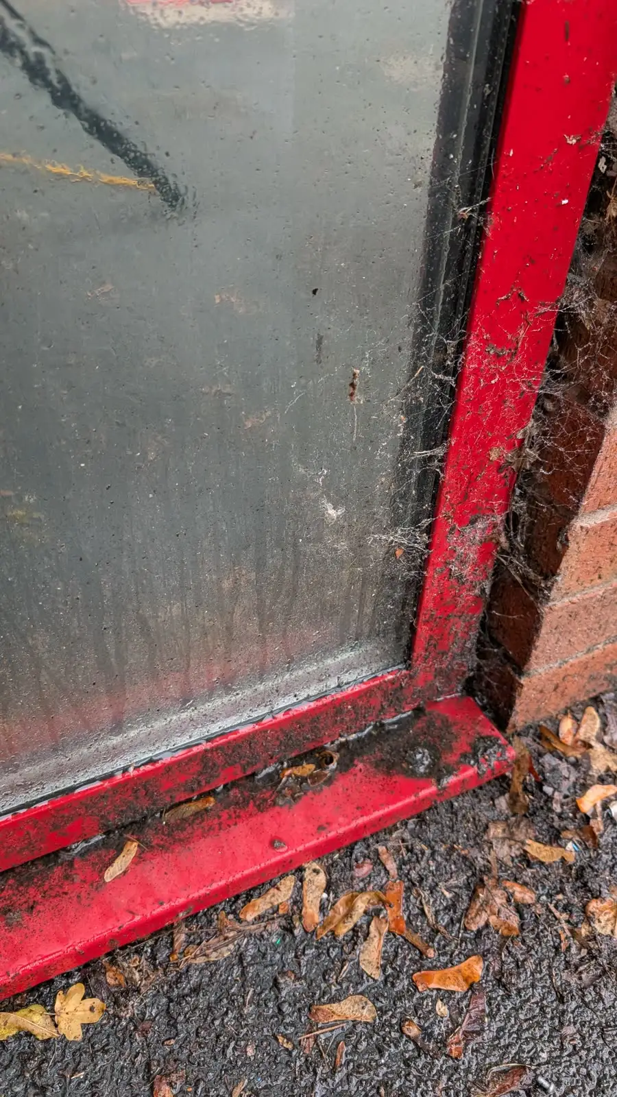 Shopfront window, Hackney — before cleaning